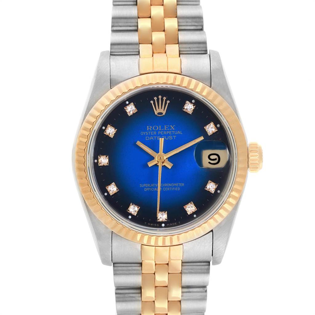 The image shows a front view of a Rolex Mid-Size 68273 Women's Steel and Gold (two tone) Blue Dial 68273 Women's Steel and Gold (two tone) Blue Dial Datejust watch with a two-tone bracelet and blue dial.