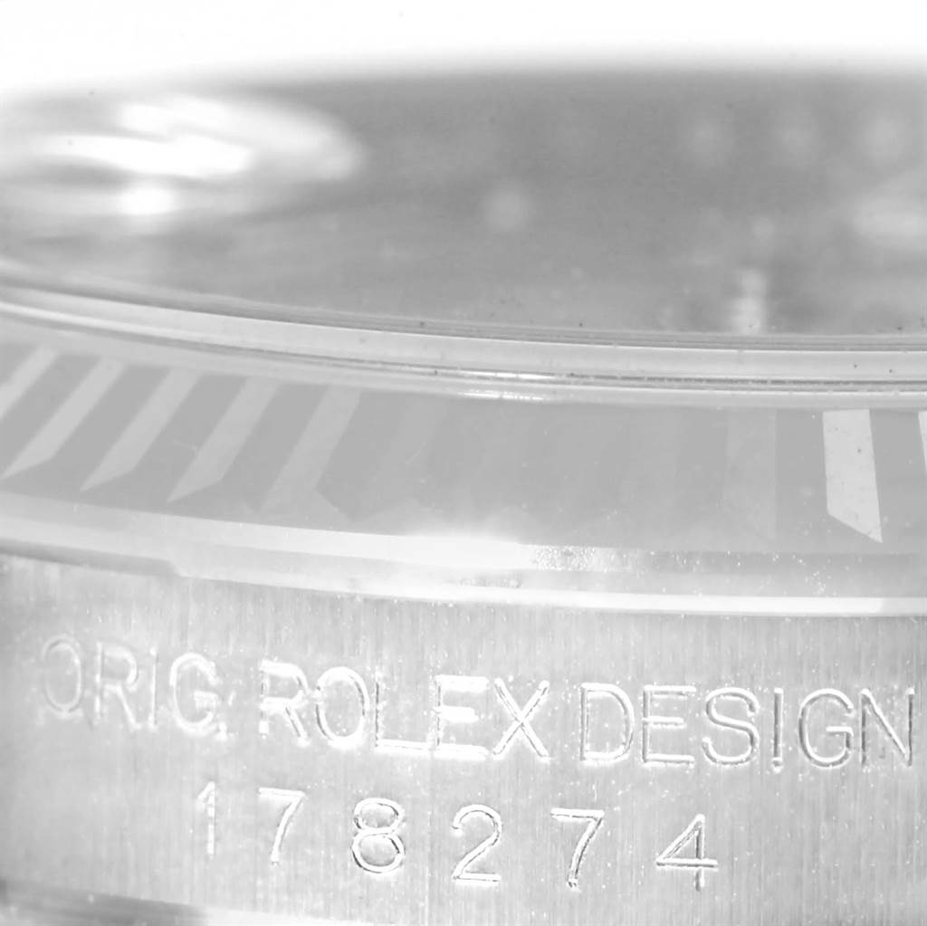 The image shows a close-up angle of the case side with the model number engraved on the Rolex Mid-Size 178274 Women's Stainless Steel Silver Dial 178274 Women's Stainless Steel Silver Dial watch.