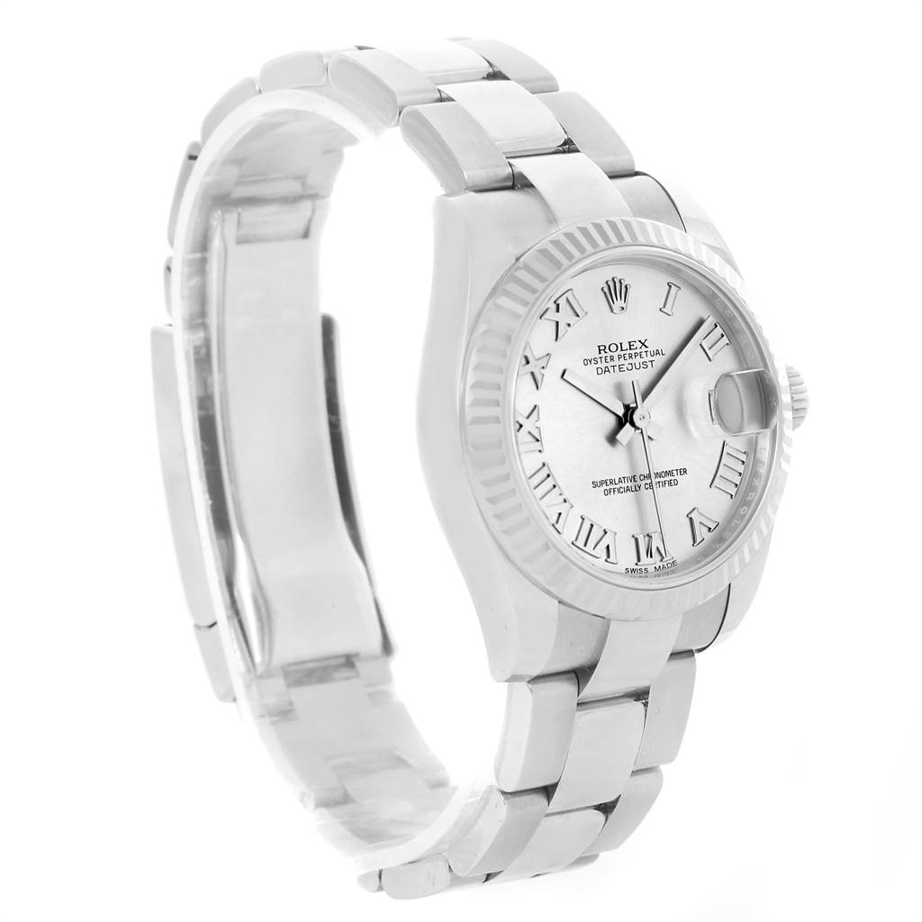 The image shows a side angle of a Rolex Mid-Size 178274 Women's Stainless Steel Silver Dial 178274 Women's Stainless Steel Silver Dial Oyster Perpetual Datejust watch, highlighting the bracelet, bezel, and dial with Roman numerals.