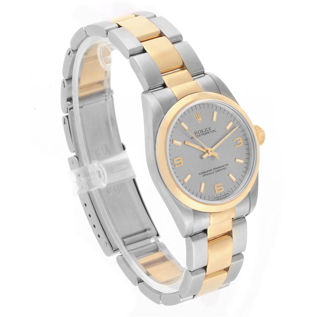 This image shows a Rolex Mid-Size 67483 Women's Steel and Gold (two tone) Grey Dial 67483 Women's Steel and Gold (two tone) Grey Dial model watch at a three-quarter angle, displaying the dial, bezel, and two-tone bracelet.