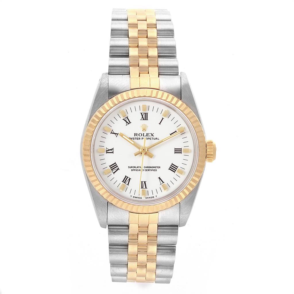 This image shows a frontal view of a Rolex Mid-Size 67513 Women's Steel and Gold (two tone) White Dial 67513 Women's Steel and Gold (two tone) White Dial with a two-tone bracelet and a fluted gold bezel.