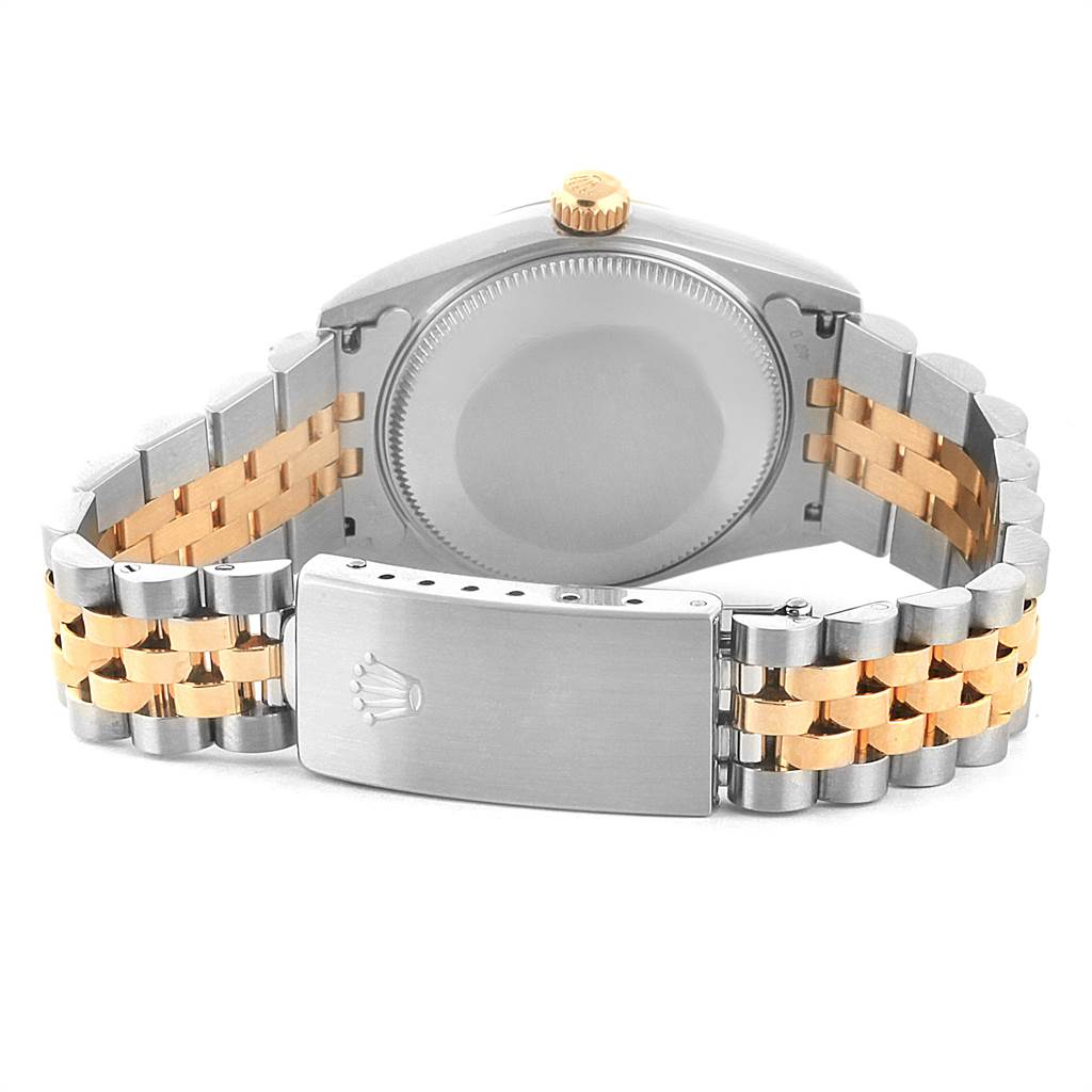 The image shows the backside of a Rolex Mid-Size 78273 Women's Steel and Gold (two tone) Mother of Pearl Dial 78273 Women's Steel and Gold (two tone) Mother of Pearl Dial watch, highlighting the case back, bracelet, and clasp with the Rolex logo.
