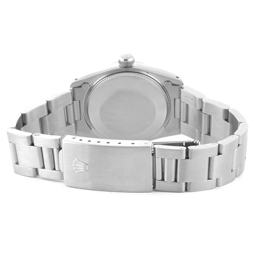 The image shows the back and bracelet of a Rolex Mid-Size 67480 Women's Stainless Steel Silver Dial 67480 Women's Stainless Steel Silver Dial model watch.