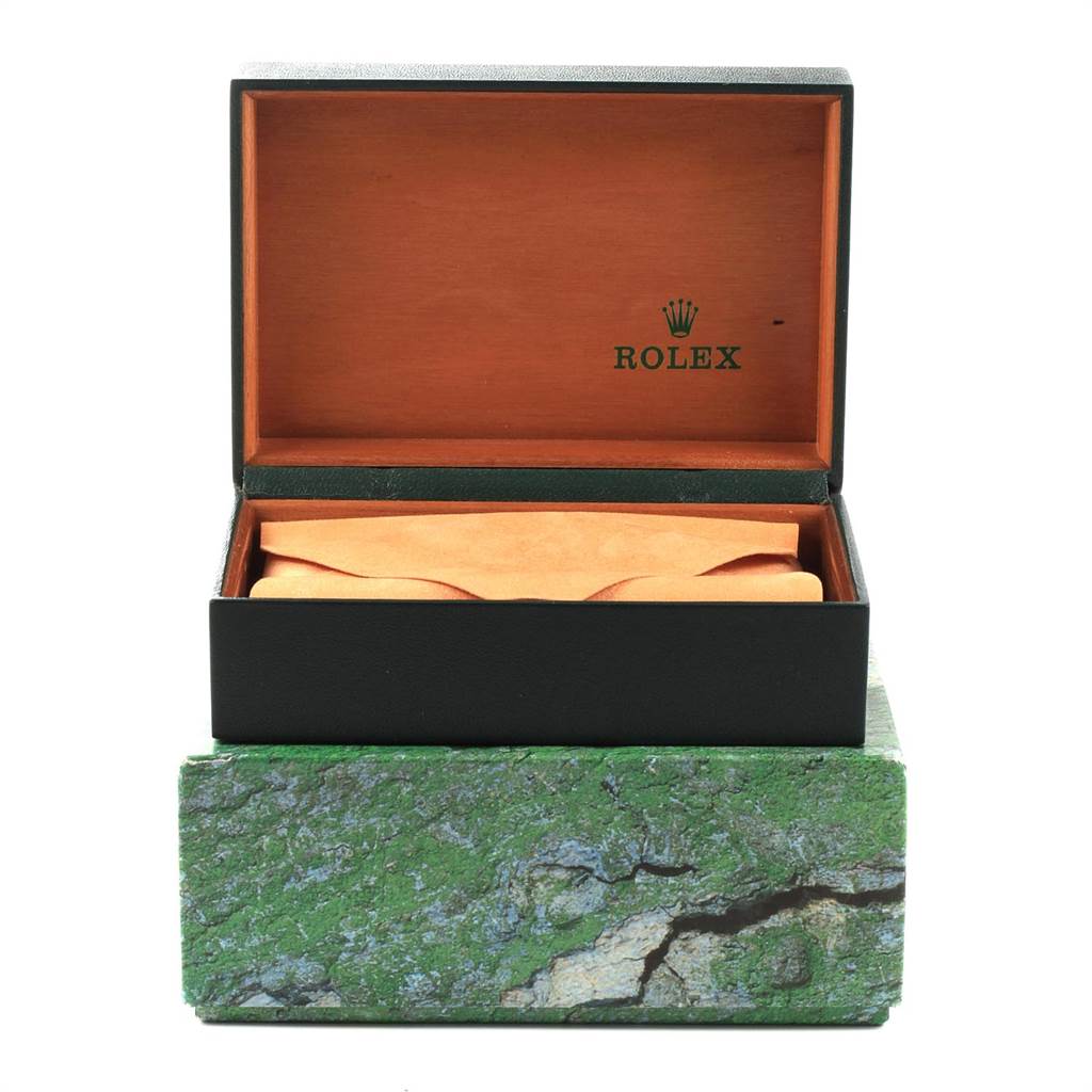 The image shows an open Rolex watch box for a Mid-Size model, revealing the interior padding and branding.