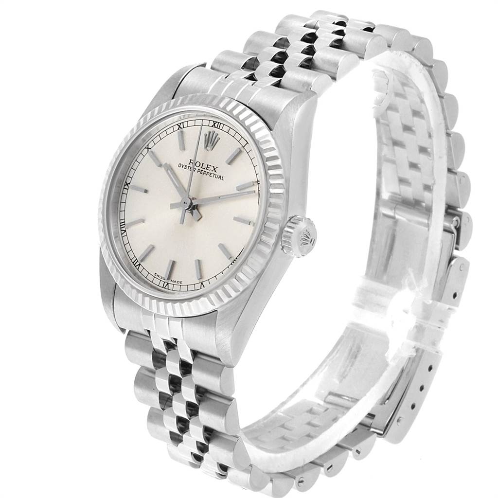 The image shows a Rolex Oyster Perpetual Mid-Size watch, angled to display the face, bezel, crown, and bracelet.