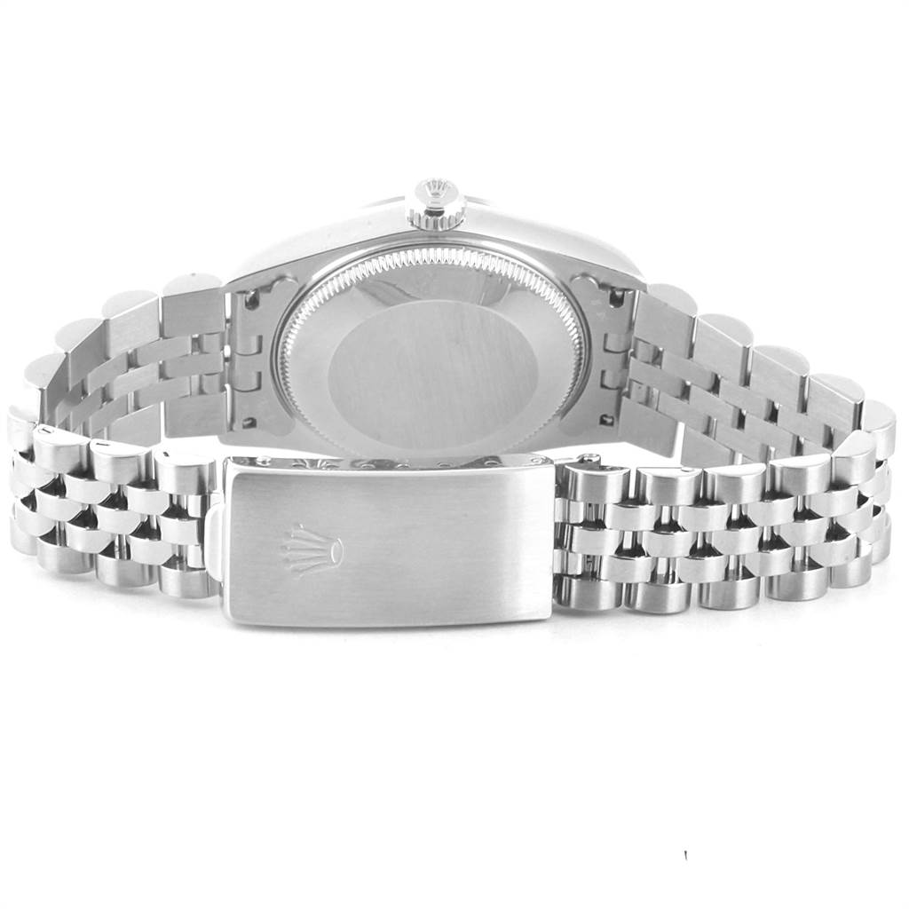 The image shows the back case and bracelet of a Rolex Mid-Size 77014 Women's Stainless Steel Silver Dial 77014 Women's Stainless Steel Silver Dial model watch.