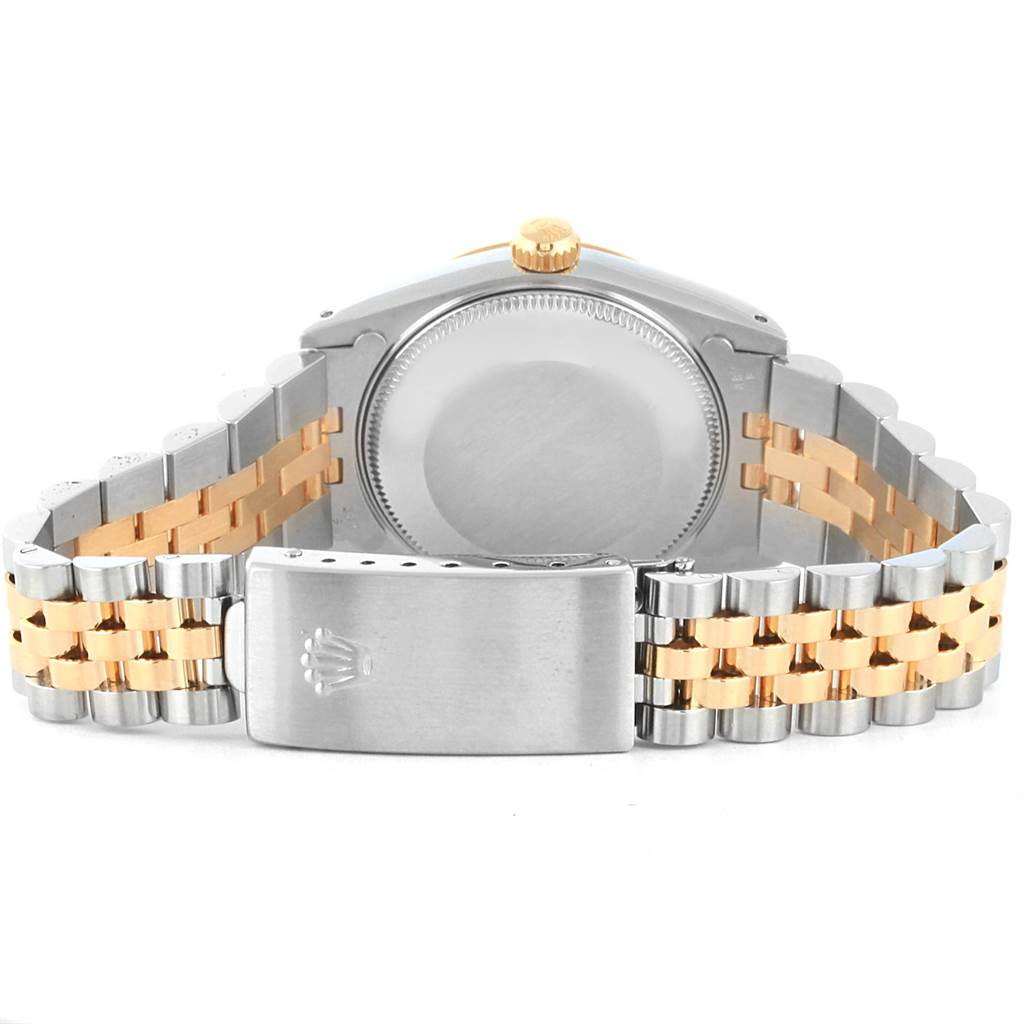 The image shows the back view of a Mid-Size Rolex watch, highlighting the case back, crown, and two-tone bracelet with the clasp closed.