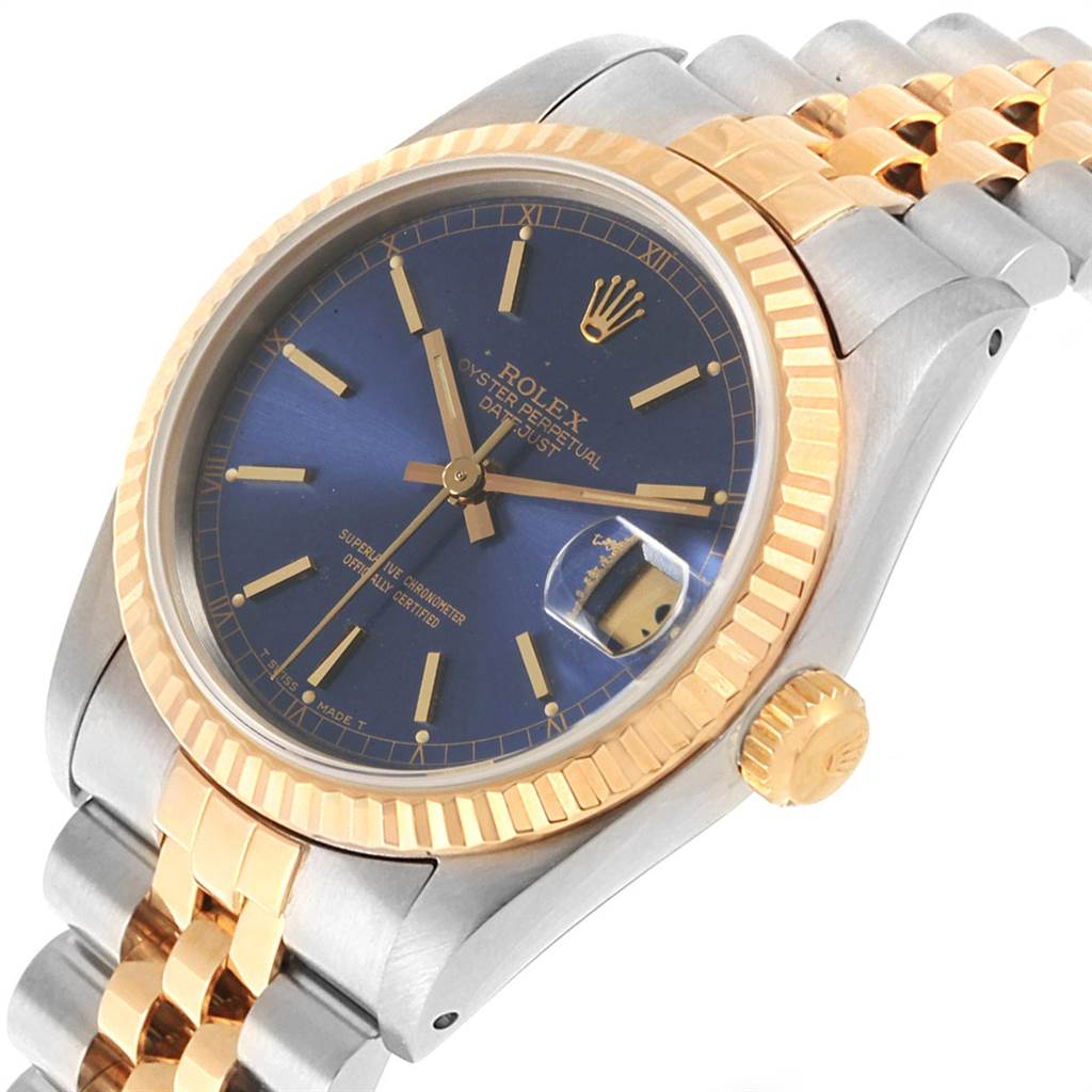 This Rolex Mid-Size 68273 Women's Steel and Gold (two tone) Blue Dial 68273 Women's Steel and Gold (two tone) Blue Dial watch is shown from a three-quarter angle displaying the dial, bezel, crown, and part of the bracelet.