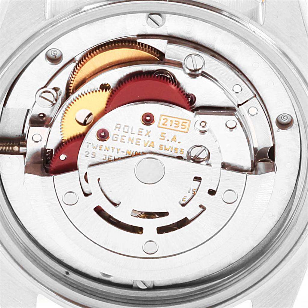 This image shows the internal mechanism of a Rolex Mid-Size 68273 Women's Steel and Gold (two tone) Blue Dial 68273 Women's Steel and Gold (two tone) Blue Dial model watch, focusing on the movement's gears and components.
