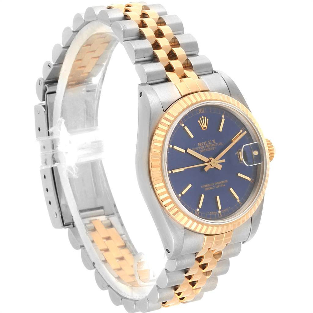 The image shows a side angle view of a Rolex Mid-Size 68273 Women's Steel and Gold (two tone) Blue Dial 68273 Women's Steel and Gold (two tone) Blue Dial model, displaying the watch face, bezel, and two-tone bracelet.