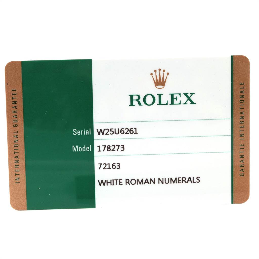 The image shows an international guarantee card for a Rolex Mid-Size 178273 Women's Steel and Gold (two tone) White Dial 178273 Women's Steel and Gold (two tone) White Dial model 178273 with the serial W25U6261.