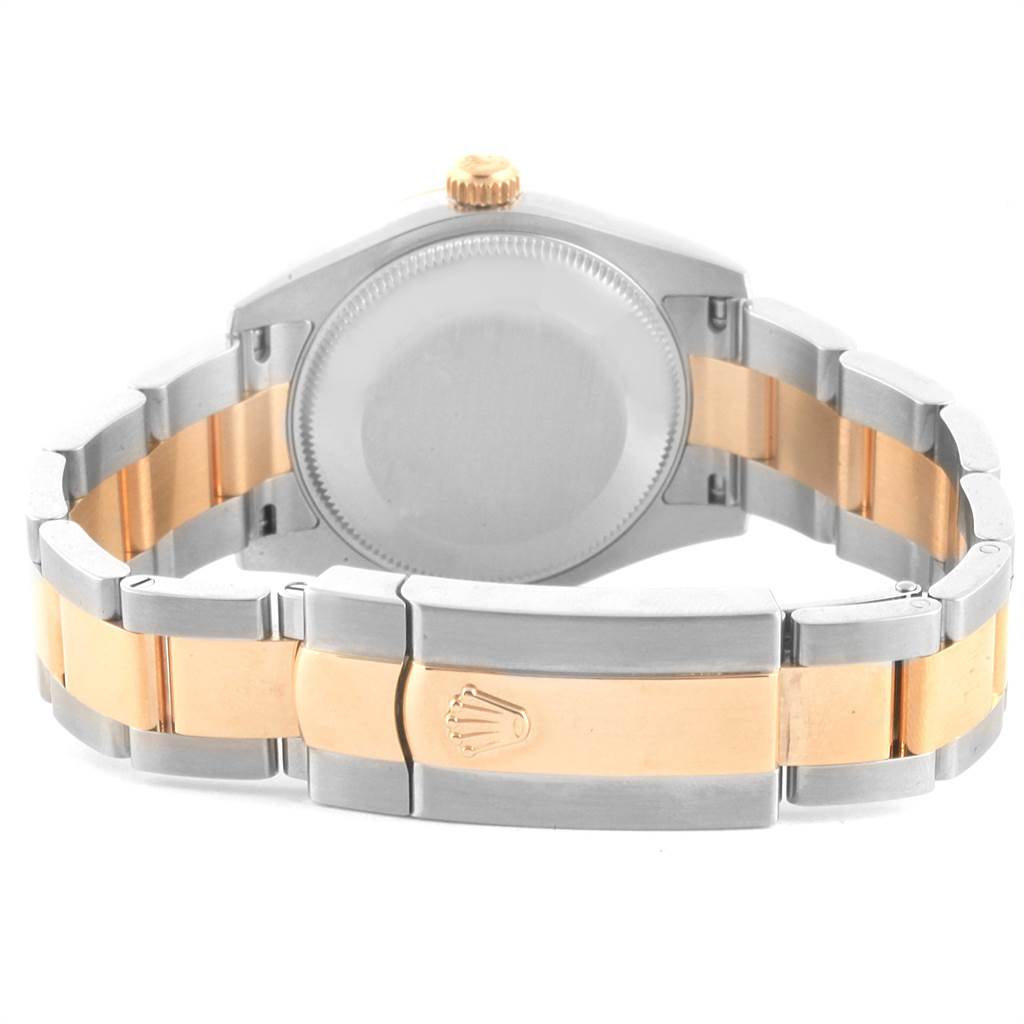 This image shows the back view of the Rolex Mid-Size 178273 Women's Steel and Gold (two tone) White Dial 178273 Women's Steel and Gold (two tone) White Dial model watch with the case back and two-tone bracelet visible.