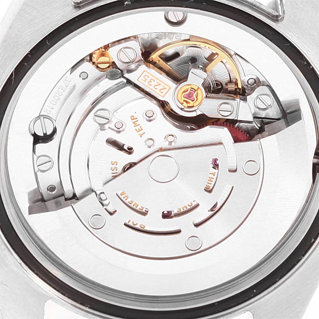 The image shows the intricate movement of a Rolex Mid-Size 178273 Women's Steel and Gold (two tone) White Dial 178273 Women's Steel and Gold (two tone) White Dial model watch viewed from the back.