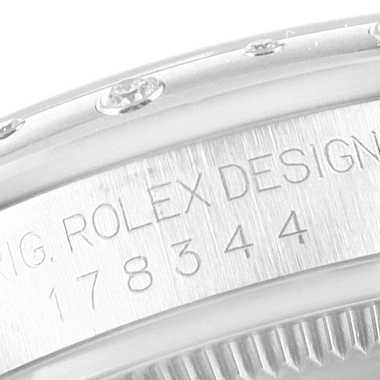 The image shows a close-up of the side of a Rolex Mid-Size 178344 Women's Stainless Steel Mother of Pearl Dial 178344 Women's Stainless Steel Mother of Pearl Dial watch, highlighting the model number 178344 and diamond-studded bezel.