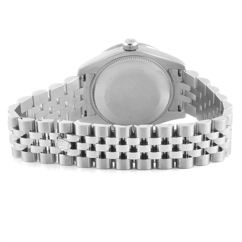 The image shows the back case and bracelet of a Mid-Size Rolex watch from a rear angle.