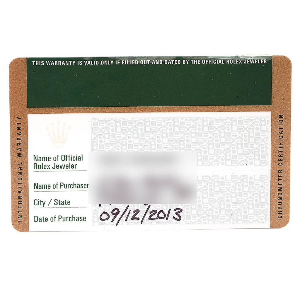 This image shows the warranty card for a Mid-Size Rolex watch, including the purchase date and jeweler's details.