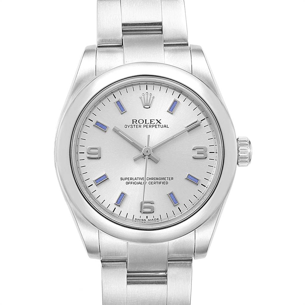 This Rolex Mid-Size 177200 Women's Stainless Steel Silver Dial 177200 Women's Stainless Steel Silver Dial Oyster Perpetual watch is shown from the front, displaying its silver dial, markers, and part of the bracelet.