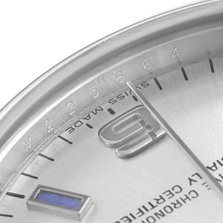 The image shows a close-up of the dial and bezel of a Rolex Mid-Size 177200 Women's Stainless Steel Silver Dial 177200 Women's Stainless Steel Silver Dial watch, focusing on the "Swiss Made" text and part of the numerals.