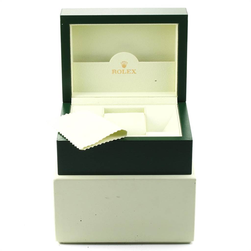 The image shows an open Rolex Mid-Size 177200 Women's Stainless Steel Silver Dial 177200 Women's Stainless Steel Silver Dial watch box with the brand name inside the lid and a cleaning cloth.