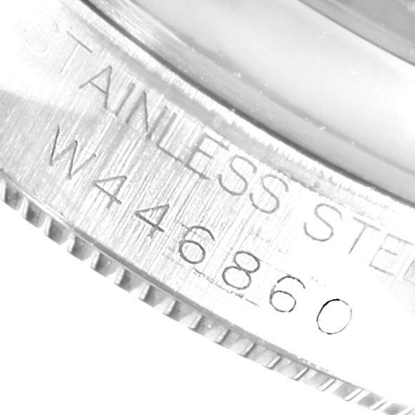This close-up image shows the engraving on the stainless steel caseback of a Mid-Size Rolex watch.