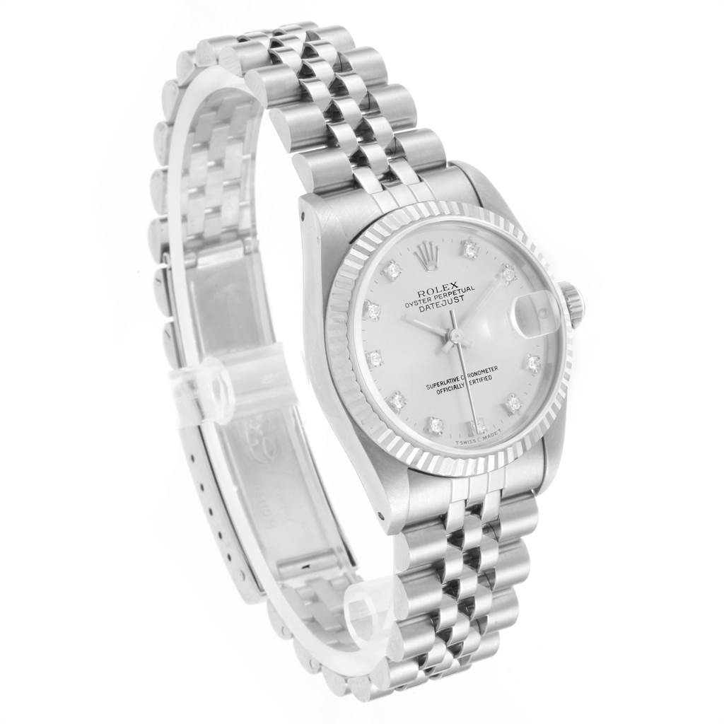 The image shows a Rolex Datejust Mid-Size watch at an angled view, displaying the dial, bezel, crown, and Jubilee bracelet.