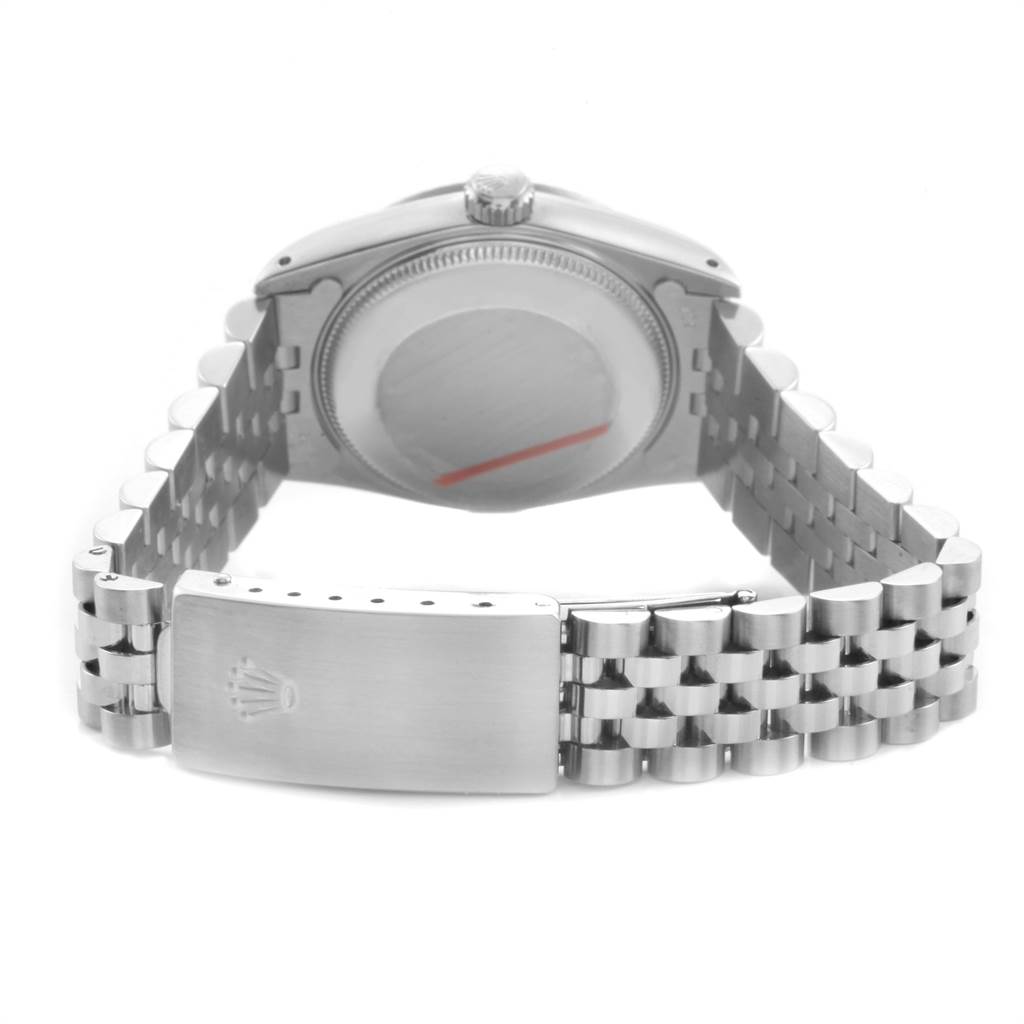 The image shows the backside and clasp of a Mid-Size Rolex watch in a stainless steel finish.