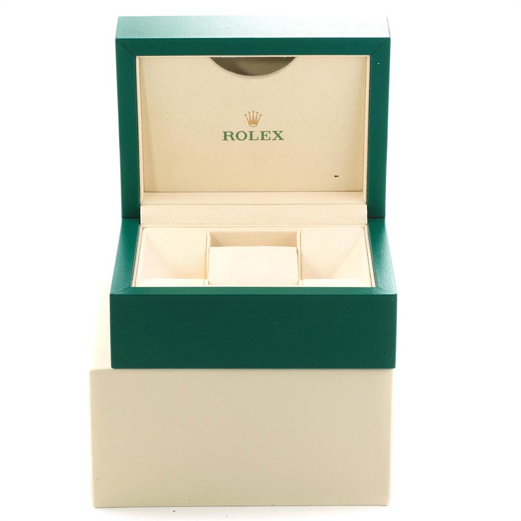 The image shows an open Rolex watch box for a Mid-Size model, featuring slots for the watch and additional accessories.