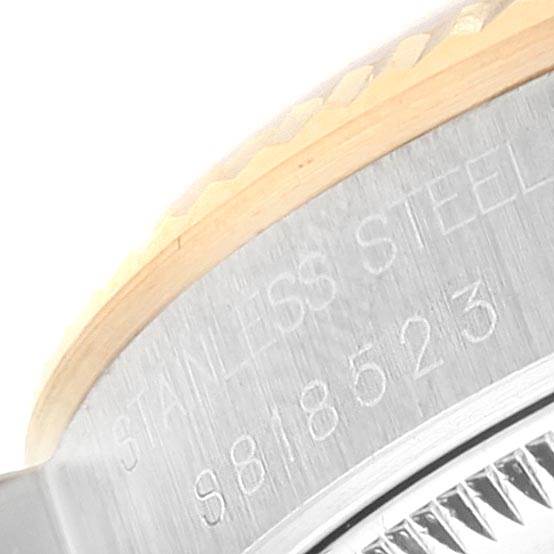 The image shows a close-up of the case back of a Rolex Mid-Size 68273 Women's Steel and Gold (two tone) Blue Dial 68273 Women's Steel and Gold (two tone) Blue Dial model, highlighting the stainless steel engraving.