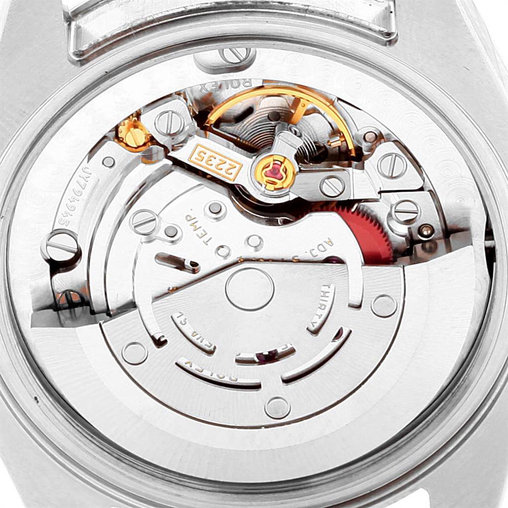 This is a close-up view of the movement mechanism inside a Rolex Mid-Size 178274 Women's Stainless Steel Blue Dial 178274 Women's Stainless Steel Blue Dial watch.