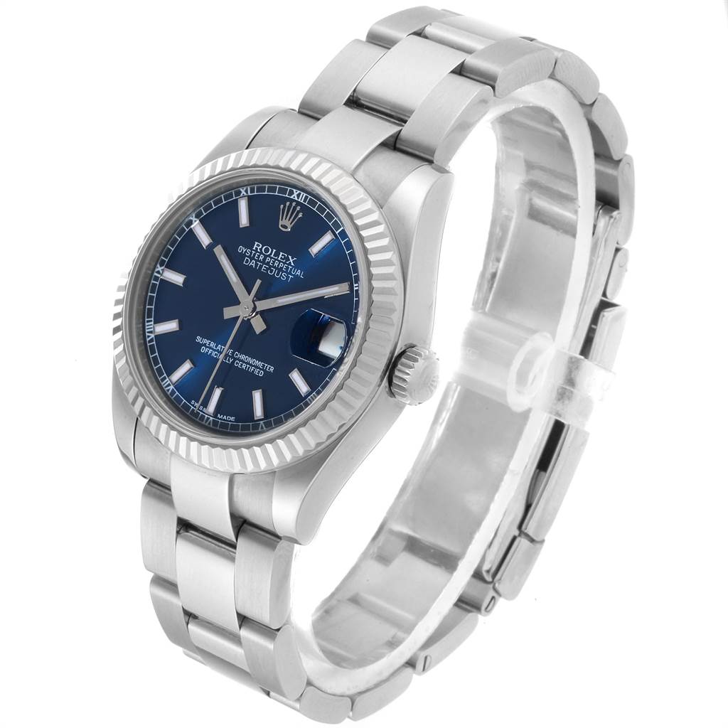 The Rolex Mid-Size 178274 Women's Stainless Steel Blue Dial 178274 Women's Stainless Steel Blue Dial watch is shown at an angled side view, displaying the face, bezel, crown, and part of the bracelet.