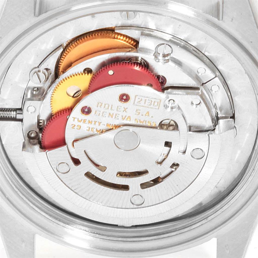 This image shows the internal movement mechanism of a Rolex Mid-Size 67513 Women's Steel and Gold (two tone) White Dial 67513 Women's Steel and Gold (two tone) White Dial watch from a back angle.