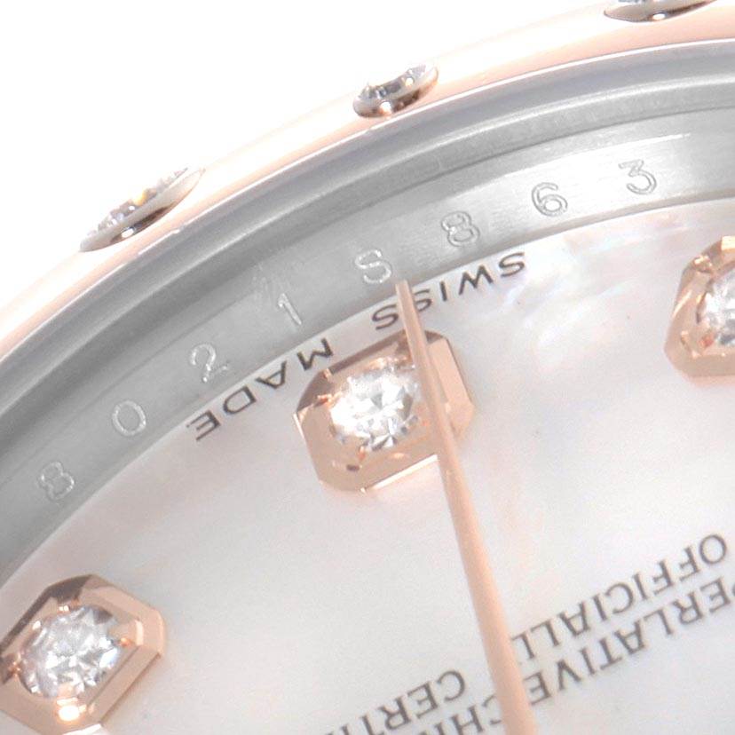 The image shows a close-up of a Rolex Mid-Size 178341 Women's Steel and Gold (two tone) Mother of Pearl Dial 178341 Women's Steel and Gold (two tone) Mother of Pearl Dial model watch dial with diamond hour markers and "Swiss Made" at the bottom.