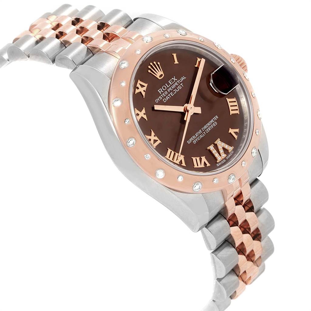 The image shows a side angle of the Rolex Mid-Size 178341 Women's Steel and Gold (two tone) Brown Dial 178341 Women's Steel and Gold (two tone) Brown Dial Datejust watch, highlighting its face, bezel, and two-tone bracelet.