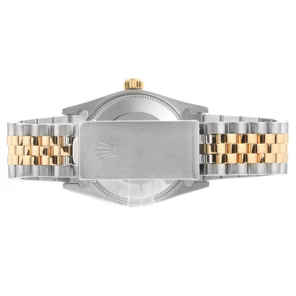 The image shows the back and bracelet of a Rolex Mid-Size 68273 Women's Steel and Gold (two tone) Silver Dial 68273 Women's Steel and Gold (two tone) Silver Dial model, featuring a two-tone metal design.