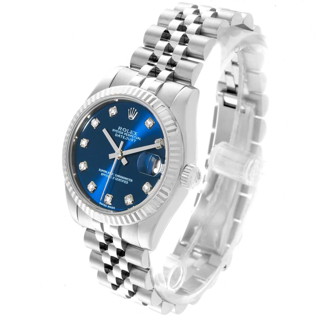 The image shows a Rolex Oyster Perpetual Datejust Mid-Size watch at a three-quarter angle, highlighting the blue dial and jubilee bracelet.