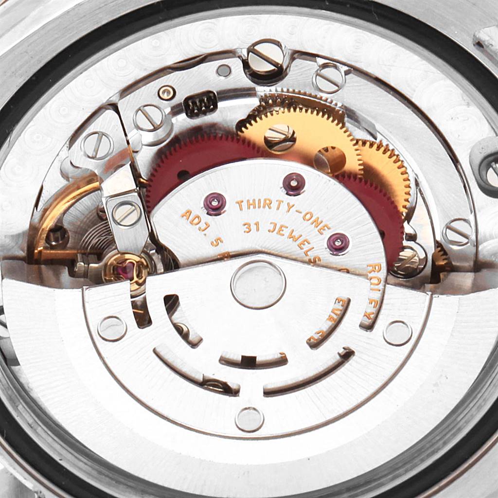 This image shows a close-up view of the internal movement mechanism of a Rolex Mid-Size 178344 Women's Stainless Steel Mother of Pearl Dial 178344 Women's Stainless Steel Mother of Pearl Dial model watch.