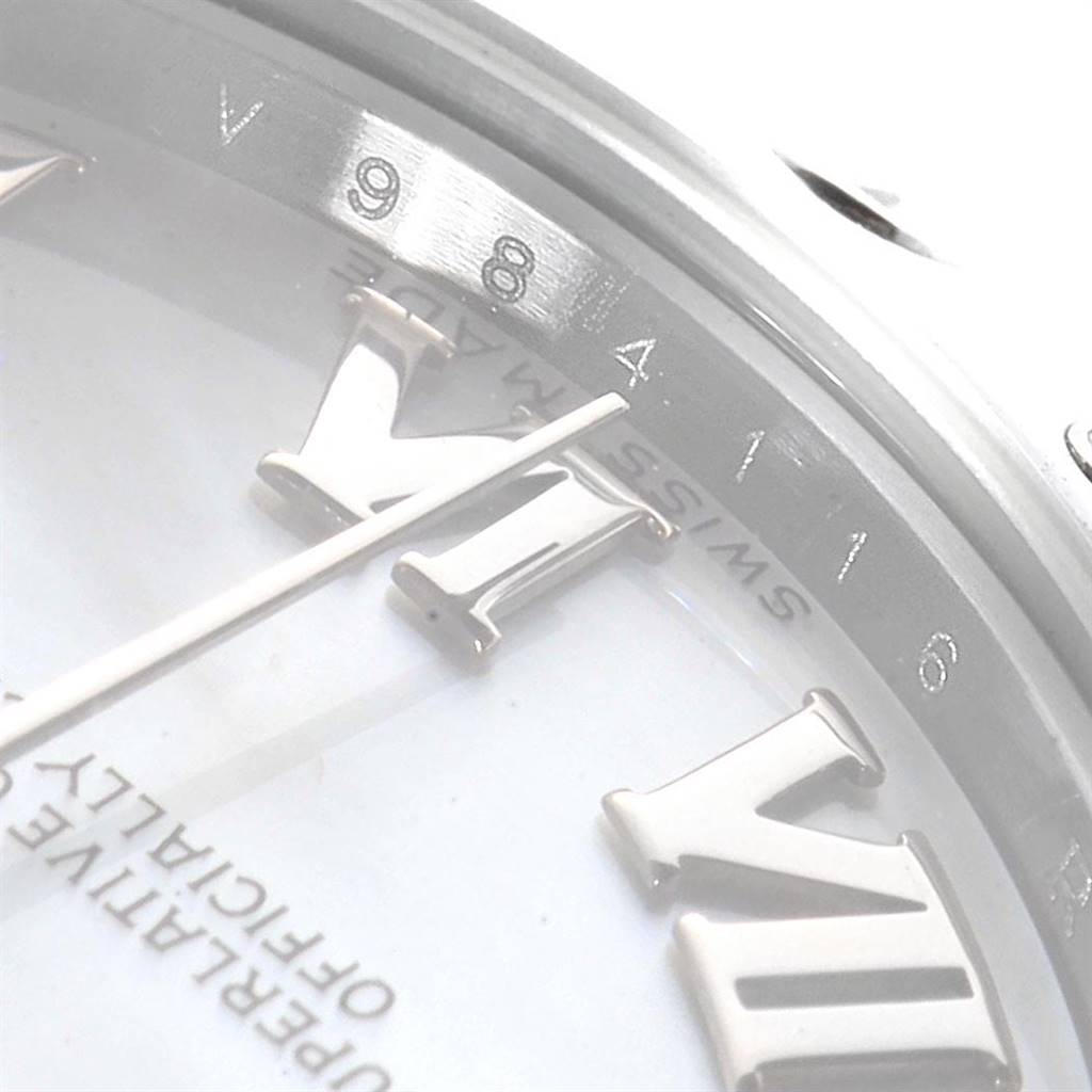 This close-up image of a Rolex Mid-Size 178344 Women's Stainless Steel Mother of Pearl Dial 178344 Women's Stainless Steel Mother of Pearl Dial model watch shows a partial view of the dial, bezel, and Roman numeral markers.