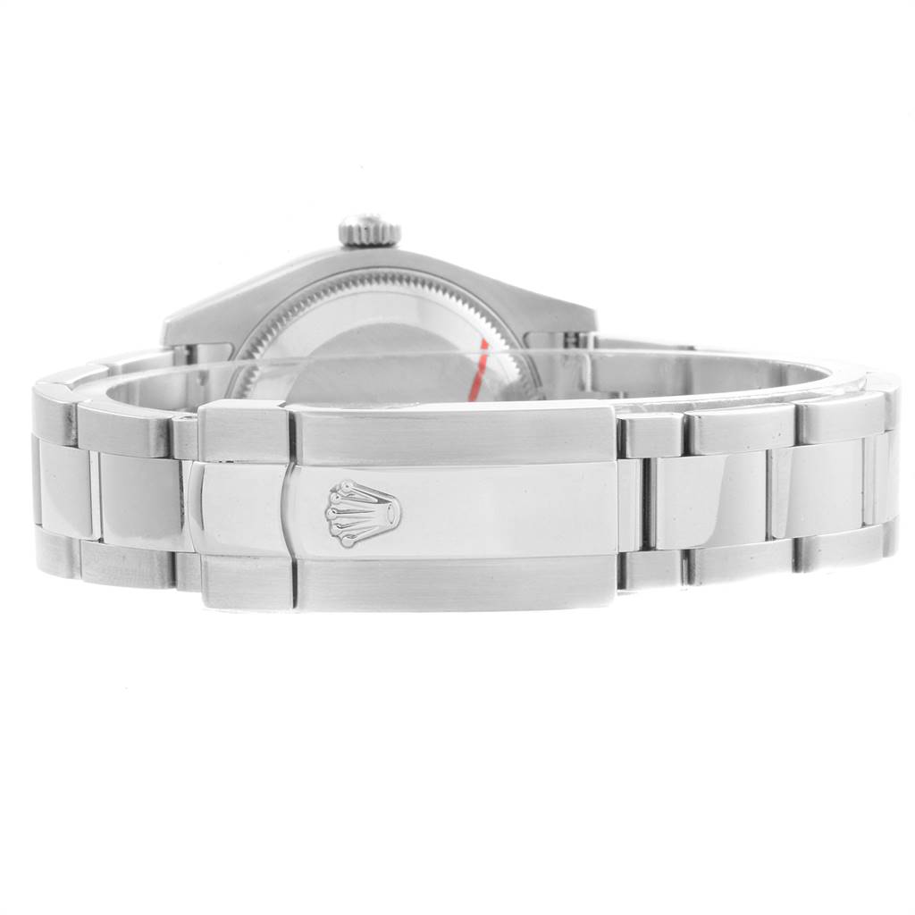 The image shows the back and clasp of a Mid-Size Rolex watch, focusing on the oyster bracelet and logo-engraved clasp.