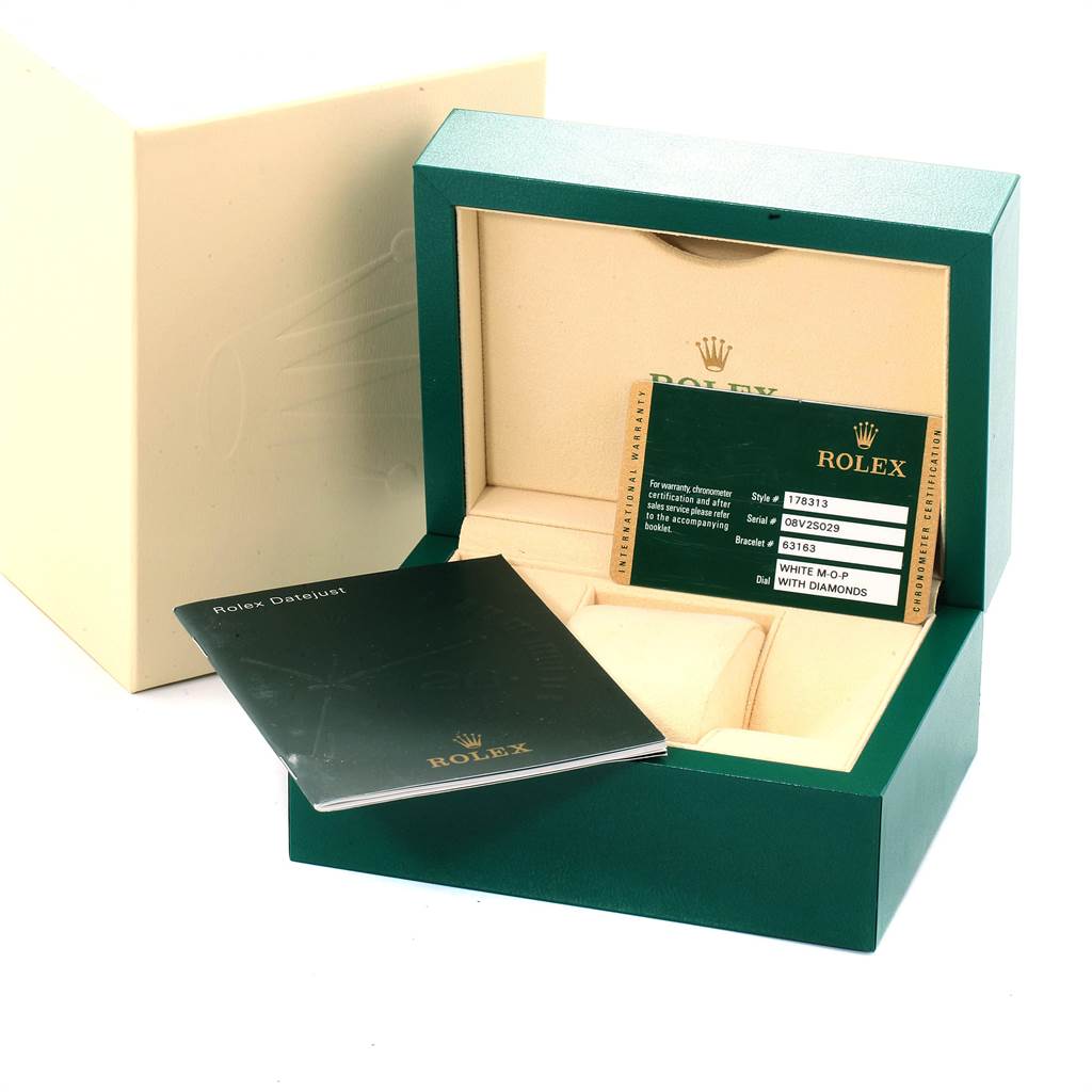 This image shows the open packaging box of a Rolex Mid-Size 178313 Women's Stainless Steel Mother of Pearl Dial 178313 Women's Stainless Steel Mother of Pearl Dial model with a warranty card and booklet.