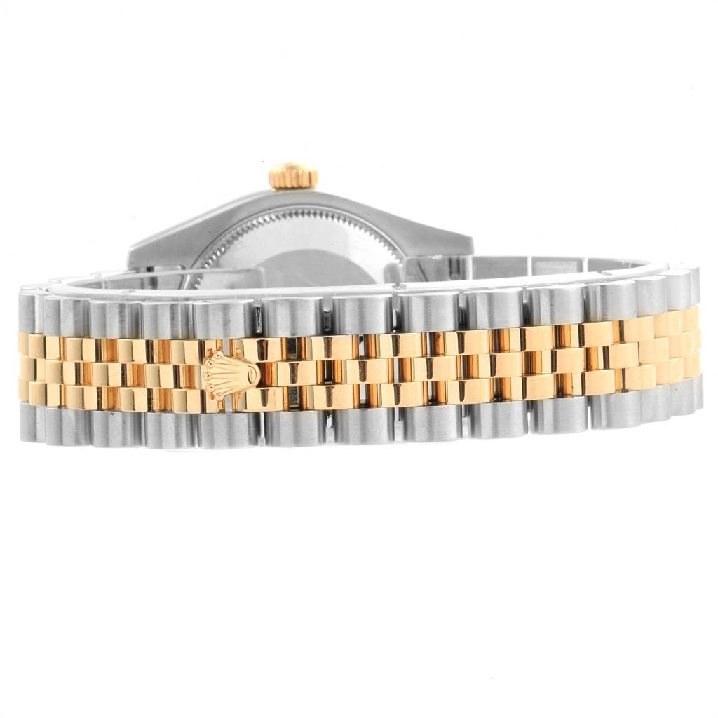 This Mid-Size Rolex watch is shown from the side, featuring the case back, crown, and two-tone bracelet with the Rolex logo.