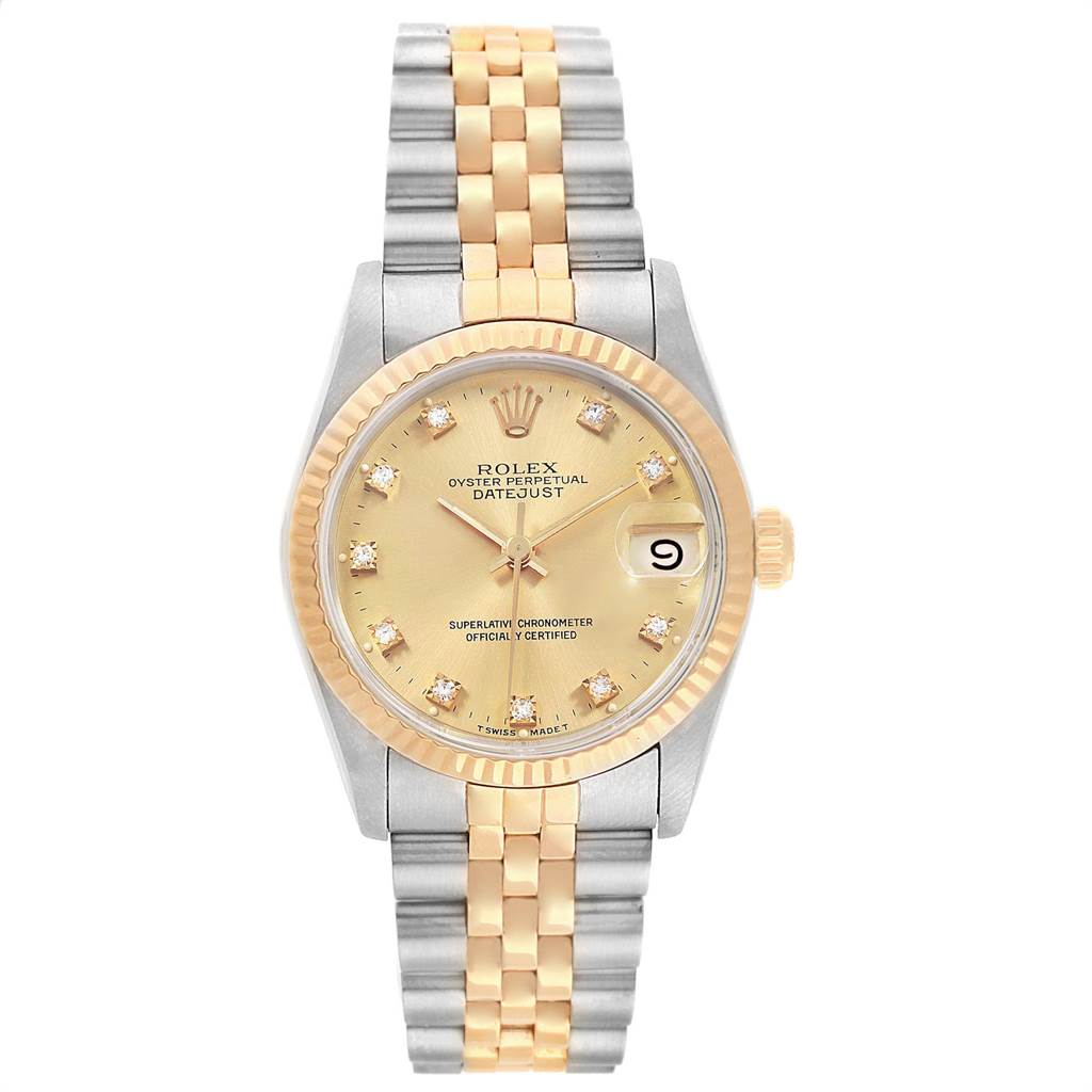 The image shows a front view of a Rolex Mid-Size 68273 Women's Steel and Gold (two tone) Champagne Dial 68273 Women's Steel and Gold (two tone) Champagne Dial Datejust watch featuring a gold dial and a two-tone metal bracelet.
