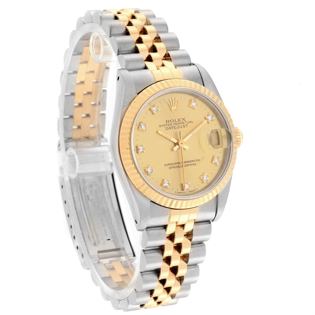 The image shows a Rolex Mid-Size 68273 Women's Steel and Gold (two tone) Champagne Dial 68273 Women's Steel and Gold (two tone) Champagne Dial Datejust watch from an angle highlighting the face, bezel, and two-tone bracelet.