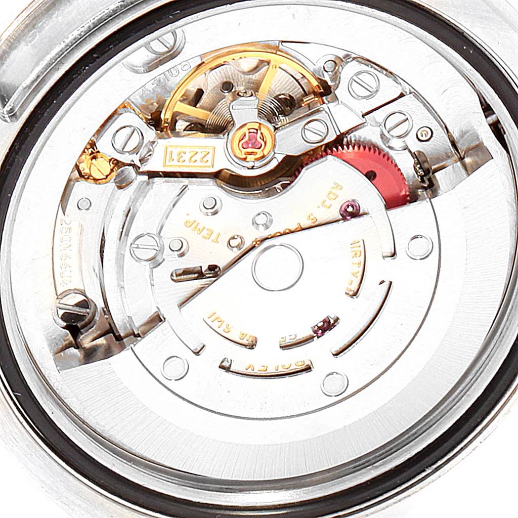 The image shows a close-up view of the movement mechanism inside a Rolex Mid-Size 177200 Women's Stainless Steel Blue Dial 177200 Women's Stainless Steel Blue Dial model watch.