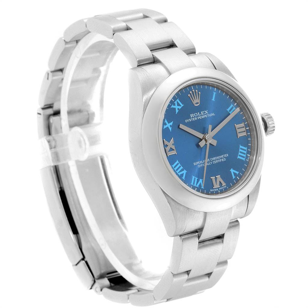 This image shows a side-angle view of a Mid-Size Rolex watch, featuring its bracelet, blue dial, and Roman numeral markers.