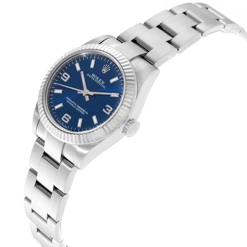 The Rolex Mid-Size 177234 Women's Stainless Steel Blue Dial 177234 Women's Stainless Steel Blue Dial watch is shown at a slight angle, highlighting its blue dial, fluted bezel, and stainless steel bracelet.