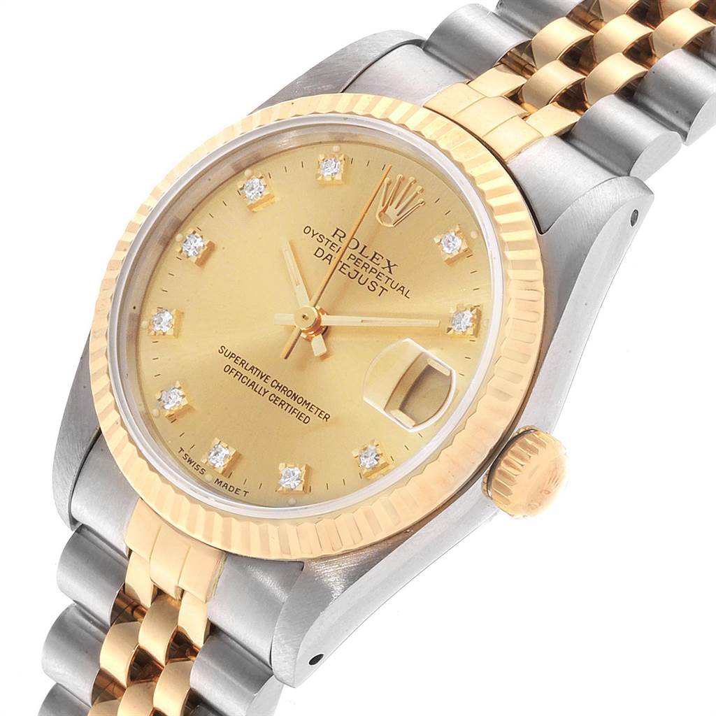 The Rolex Mid-Size 68273 Women's Steel and Gold (two tone) Champagne Dial 68273 Women's Steel and Gold (two tone) Champagne Dial model is shown at a slight angle highlighting the gold and stainless steel bracelet, dial, and cyclops date magnifier.