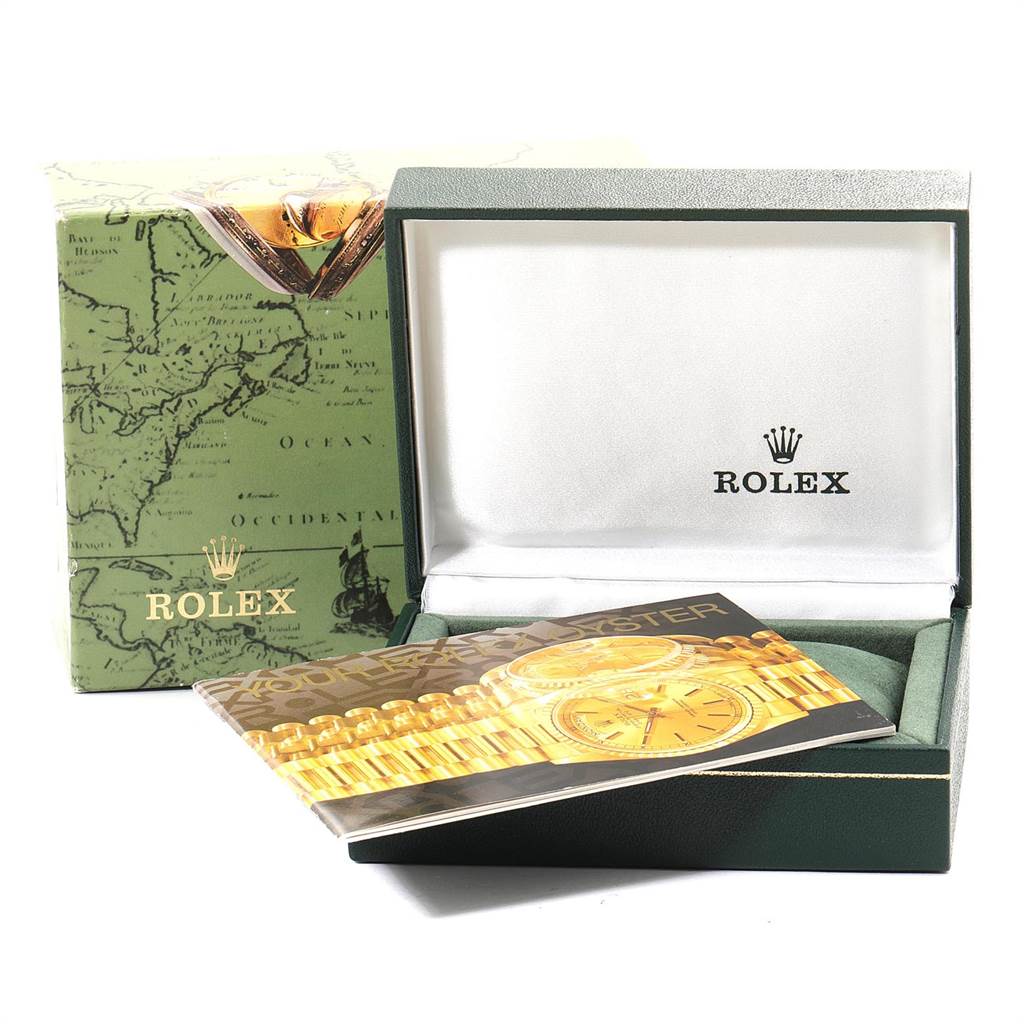 The image shows a Rolex Mid-Size 68273 Women's Steel and Gold (two tone) Champagne Dial 68273 Women's Steel and Gold (two tone) Champagne Dial model watch box and a booklet, with the box partially open.