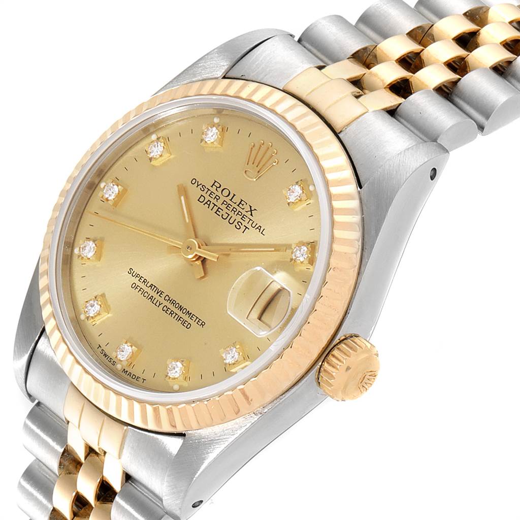 This image shows a side angle of the Rolex Mid-Size 68273 Women's Steel and Gold (two tone) Champagne Dial 68273 Women's Steel and Gold (two tone) Champagne Dial Oyster Perpetual Datejust, highlighting the dial, bezel, and bracelet.