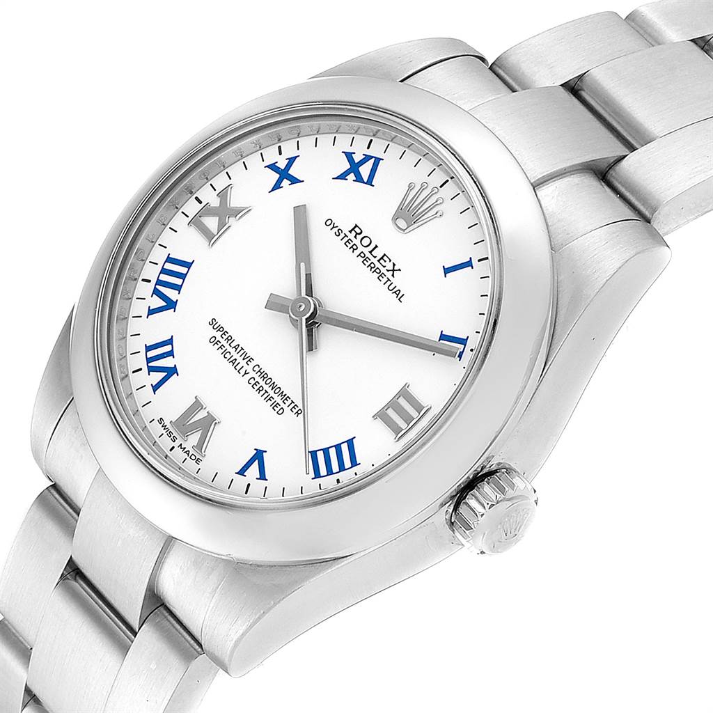 The image shows a Mid-Size Rolex Oyster Perpetual watch at a slight angle, highlighting the face, bezel, crown, and part of the bracelet.