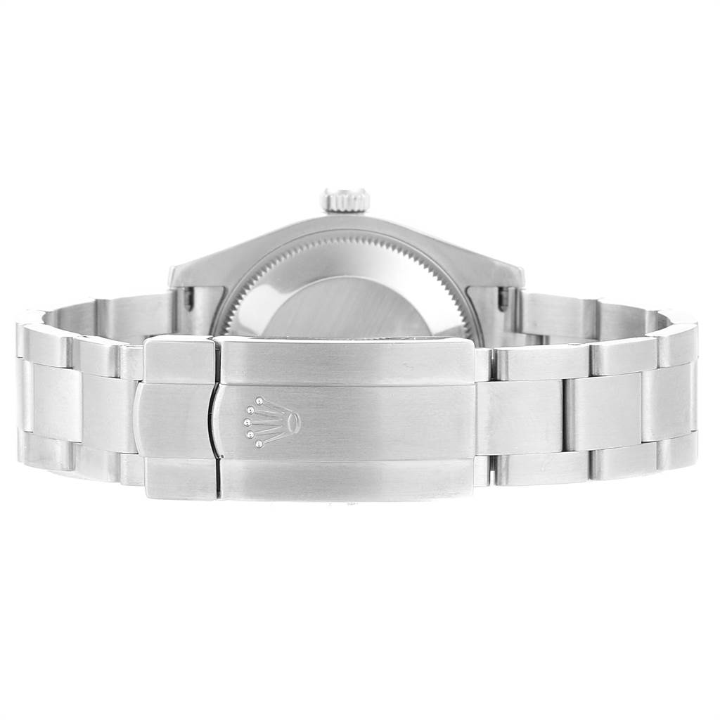 The Rolex Mid-Size 177200 Women
s Stainless Steel White Dial 177200 Women
s Stainless Steel White Dial watch is shown from the back, highlighting the bracelet and closed clasp.